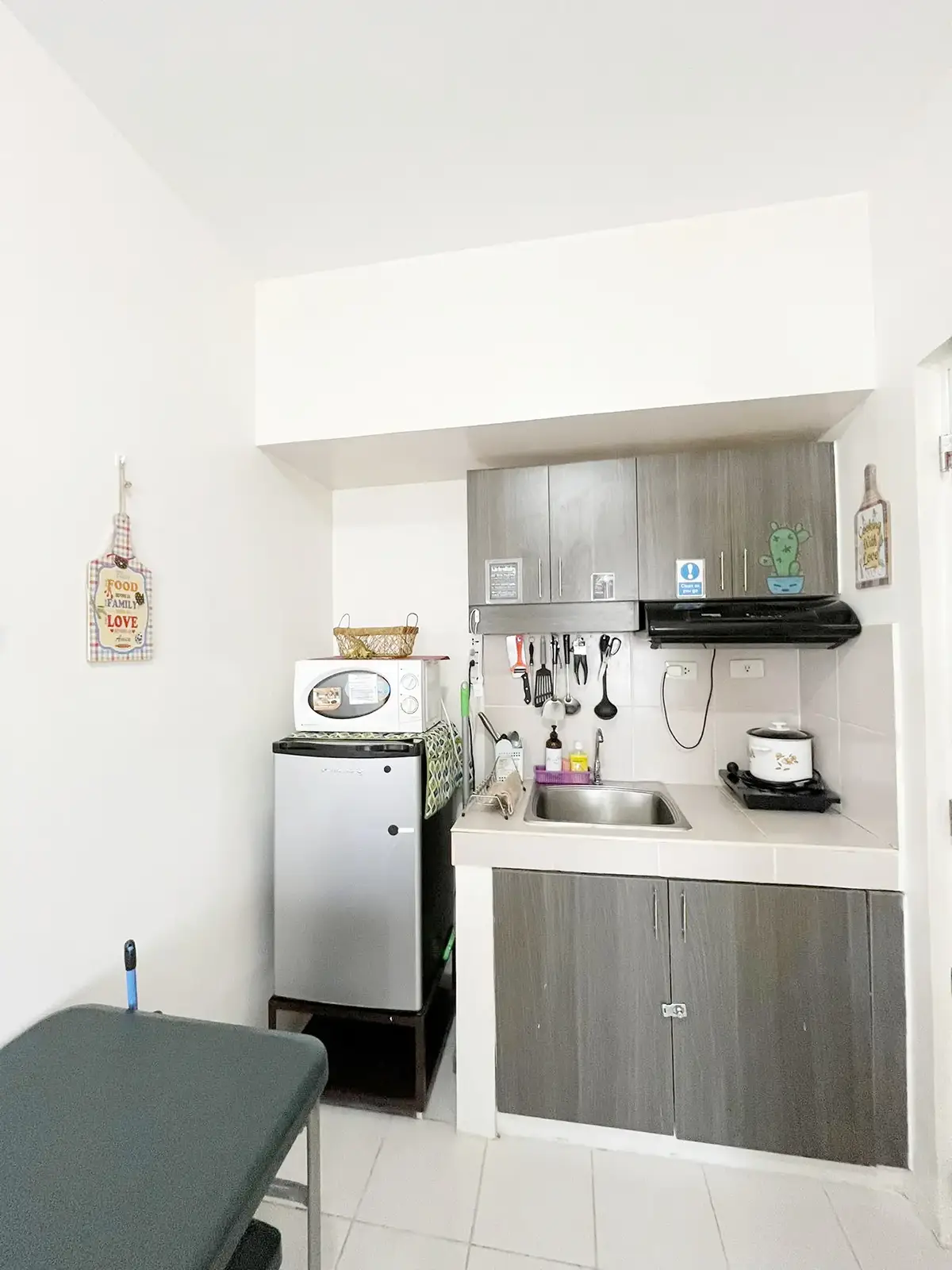 Full view of the compact light-cooking area and appliances