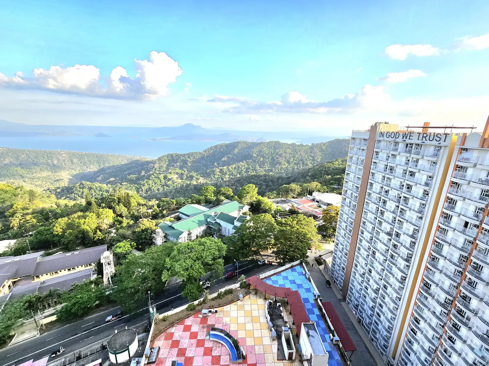 Rooftop view over Tagaytay with Taal Lake and nearby Cityland towers